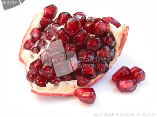 Image of Pomegranate seeds on white