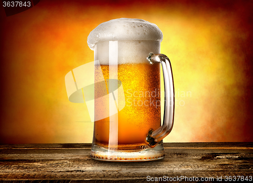 Image of Beer on yellow background