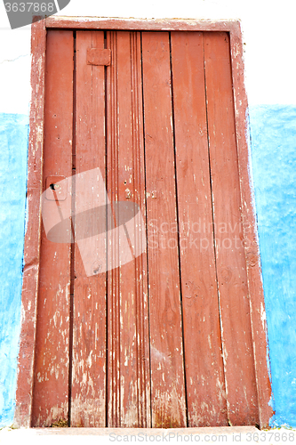 Image of historical blue  in  antique building door morocco      style af