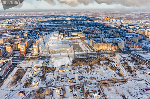 Image of Aerial view on residential district at winter