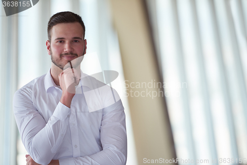 Image of business man with beard at modern office