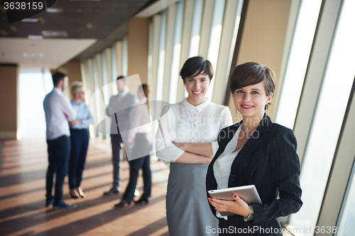 Image of business people group, females as team leaders