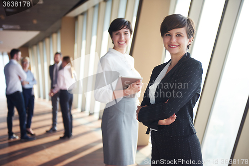 Image of business people group, females as team leaders