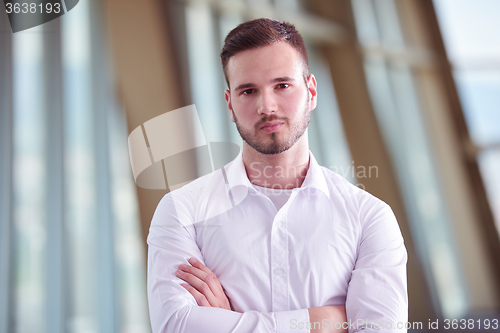 Image of business man with beard at modern office