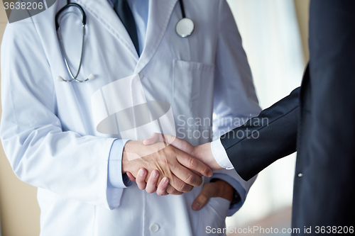 Image of doctor handshake with a patient