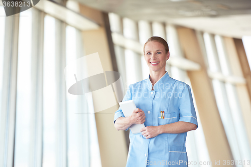 Image of female doctor with tablet computer