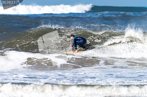 Image of Surfing the waves