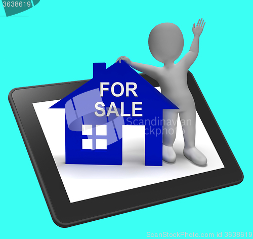 Image of For Sale House Tablet Shows Property On Market