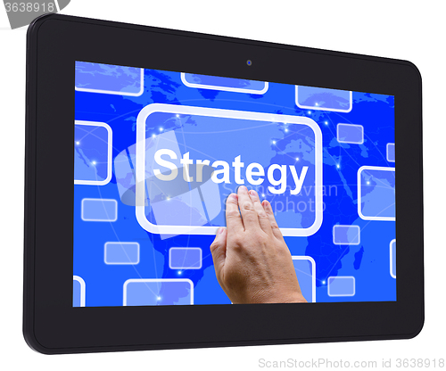 Image of Strategy Tablet Touch Screen Shows Business Solution Or Manageme