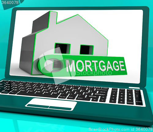 Image of Mortgage House Laptop Shows Owing Money For Property