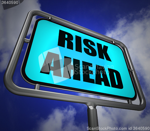 Image of Risk Ahead Signpost Shows Dangerous Unstable and Insecure Warnin
