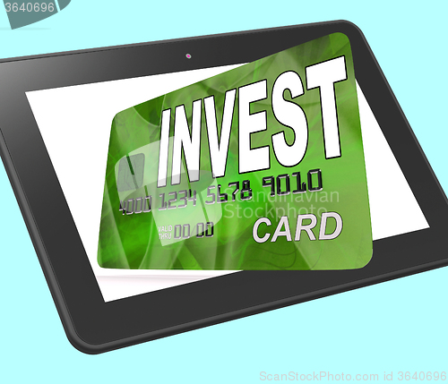 Image of Invest on Credit Debit Card Tablet Shows Investing Money