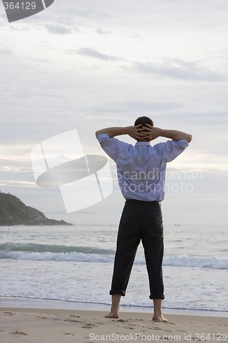 Image of Manager relaxing on the beach