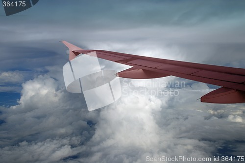 Image of Cumulonimbus and pink wing