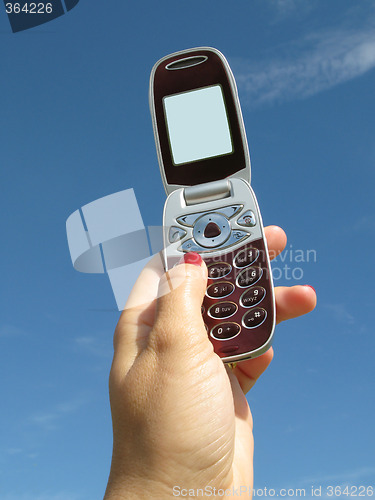 Image of Holding a Mobile Phone