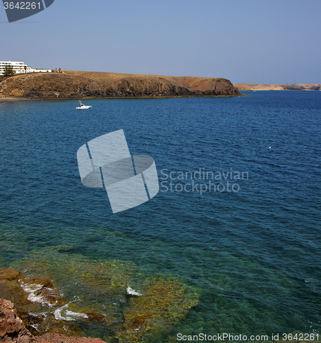 Image of coastline lanzarote  in spain musk pond beach  water yacht boat 