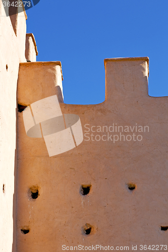 Image of brown     old ruin in    n  africa     near the tower