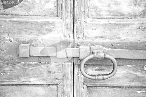 Image of europe old in  italy  antique close brown door and rusty lock  c