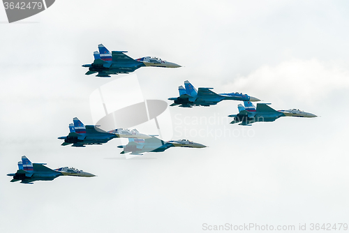 Image of Military fighters SU-27 at demonstrative flight