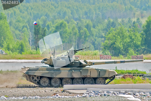 Image of Tank T-80s in motion