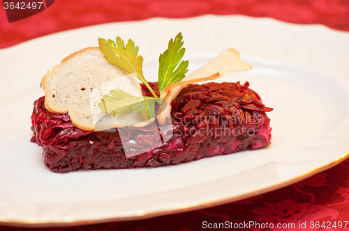 Image of beet salad with rusk bread 