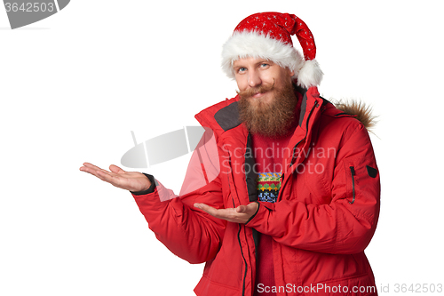 Image of bright picture of handsome man in christmas hat.