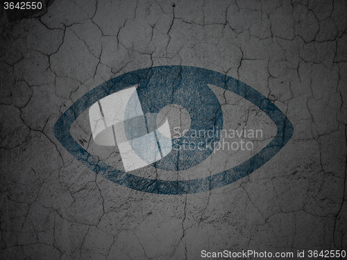 Image of Safety concept: Eye on grunge wall background