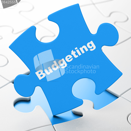 Image of Finance concept: Budgeting on puzzle background