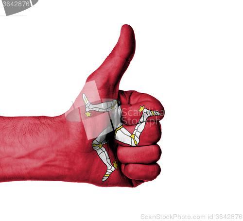 Image of Closeup of male hand showing thumbs up sign