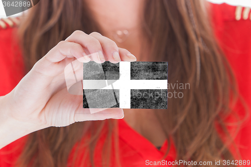 Image of Woman showing a blank business card