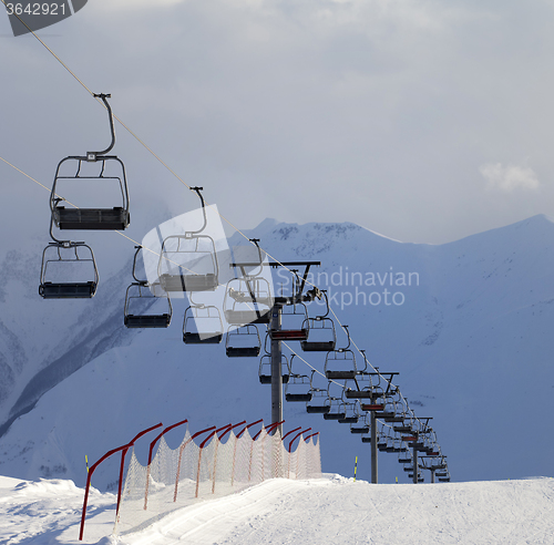 Image of Snow skiing piste and ropeway