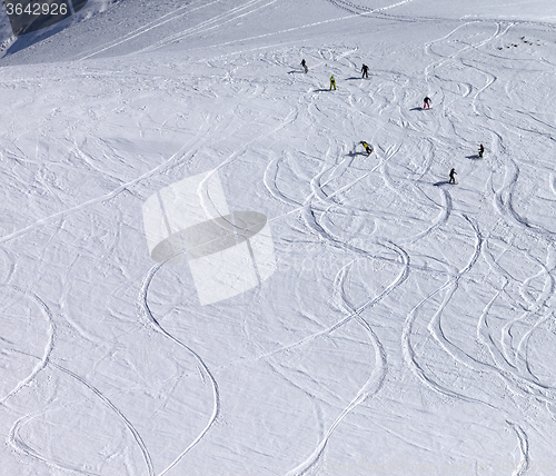 Image of Snowboarder downhill on off piste slope