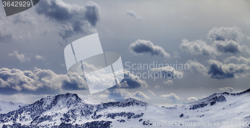 Image of Panoramic view on mountains in evening and cloudy sky