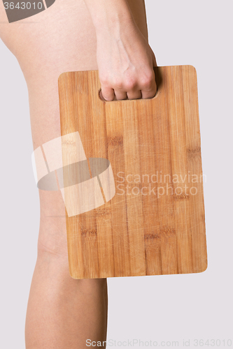 Image of girl holding chopping board