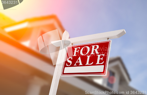 Image of Home For Sale Real Estate Sign in Front of House