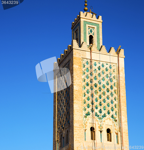 Image of history in maroc africa  minaret religion and the blue     sky