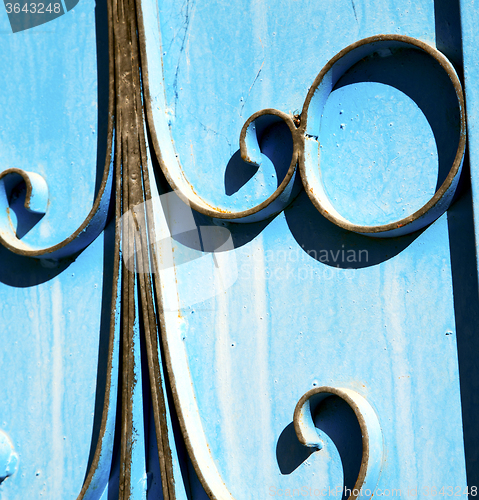 Image of blue hinges      rusty      morocco in africa the old wood  faca