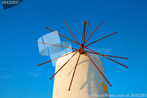 Image of old mill in santorini  sky