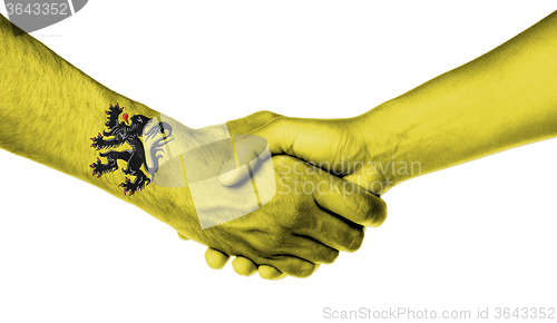 Image of Man and woman shaking hands