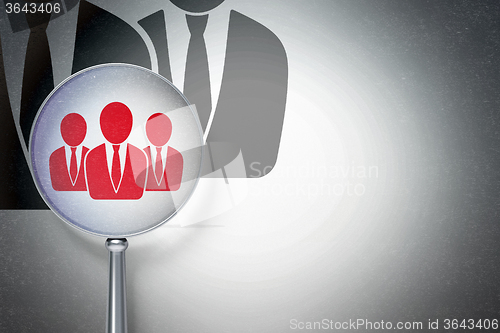 Image of Marketing concept:  Business People with optical glass on digital background