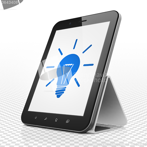 Image of Finance concept: Tablet Computer with Light Bulb on display