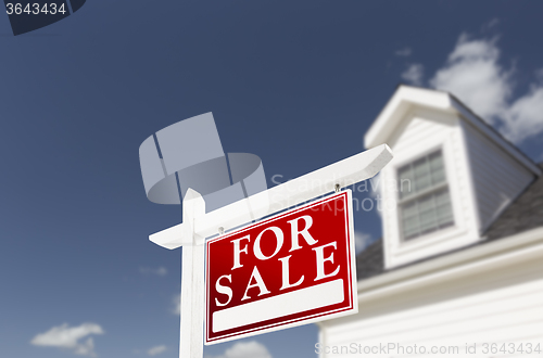 Image of Home For Sale Real Estate Sign in Front of House