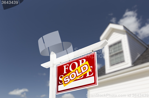 Image of Sold Home For Sale Sign in Front of New House