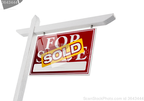 Image of Red Sold For Sale Real Estate Sign on White