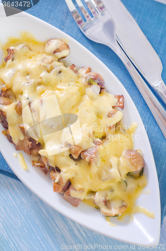 Image of fried meat with mushroom and cheese