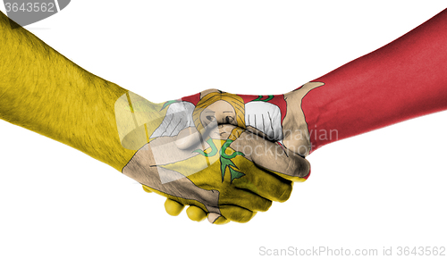 Image of Man and woman shaking hands