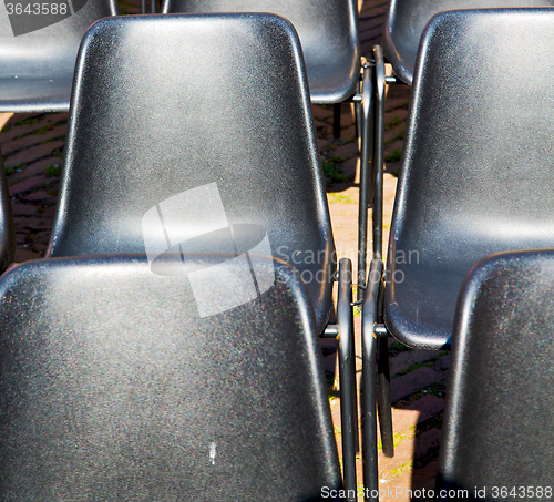 Image of empty seat in italy europe background black  texture