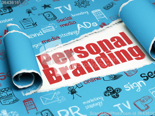 Image of Advertising concept: red text Personal Branding under the piece of  torn paper