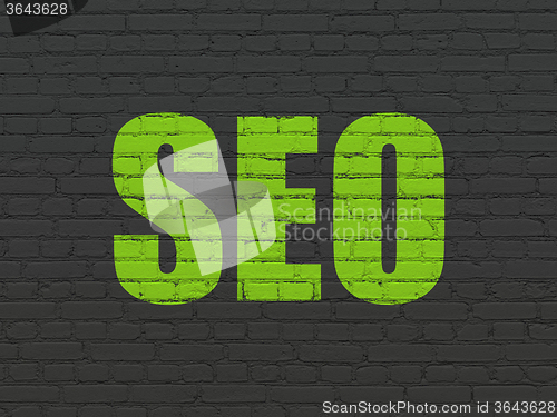 Image of Web development concept: SEO on wall background