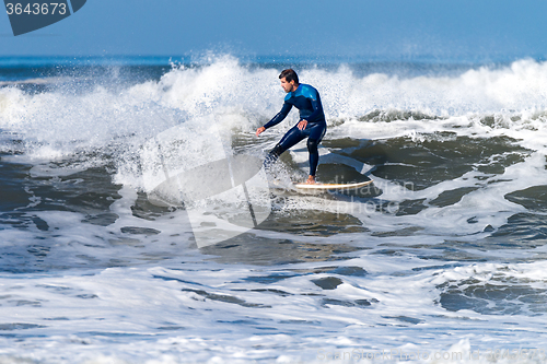 Image of Surfing the waves